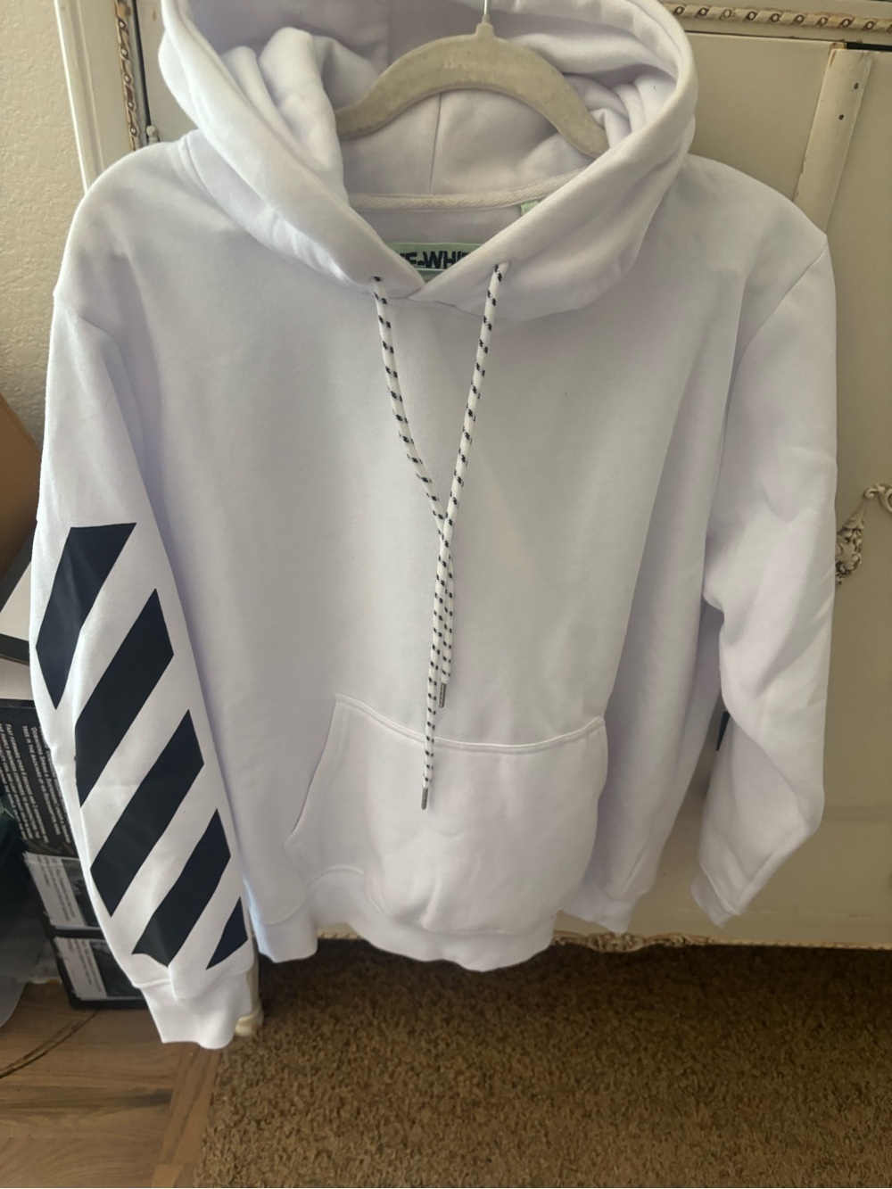 Off-White Hoodie with Black Diagonal Sleeve Stripes
